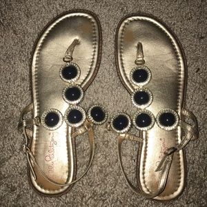 Gold and navy sandals